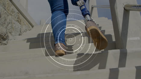 Animation-of-scope-scanning-over-woman-with-artificial-limb-walking-up-stairs