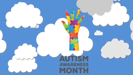 Animation-of-autism-awareness-month-over-hand-formed-with-puzzles-over-clouds-on-blue-sky