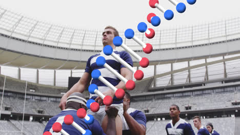 Animation-Eines-DNA-Strangs-über-Männlichen-Rugbyspielern-Im-Stadion