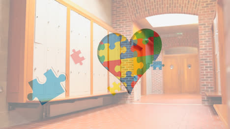 Animation-Von-Puzzles,-Die-über-Ein-Herz-Aus-Puzzles-Und-Einen-Leeren-Schulkorridor-Fallen