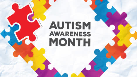 Animation-of-red-and-yellow-puzzles-autism-awareness-month-text-in-frame-with-puzzles-on-white