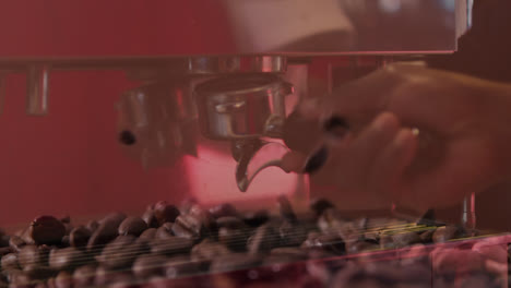 Animation-of-pouring-coffee-beans-with-hands-of-barista-preparing-coffee-at-a-cafe