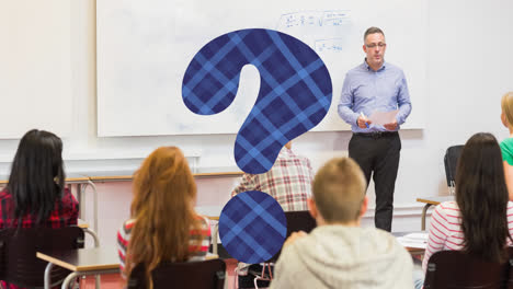 Animation-of-blue-check-question-mark-over-male-highschool-teacher-and-students-in-classroom