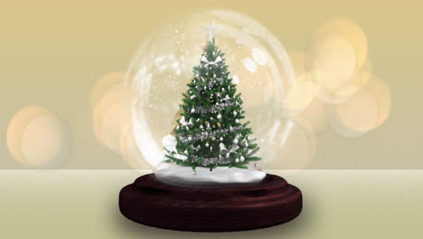Shooting-star-around-christmas-tree-in-a-snow-globe-against-spots-of-light-on-yellow-background