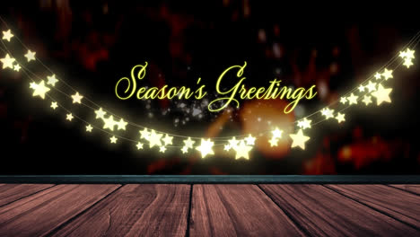 Seasons-greetings-text-and-glowing-yellow-star-shaped-fairy-light-decoration-over-wooden-plank