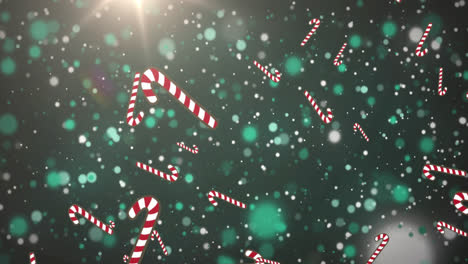 Animation-of-candy-cane-falling-over-grey-dots