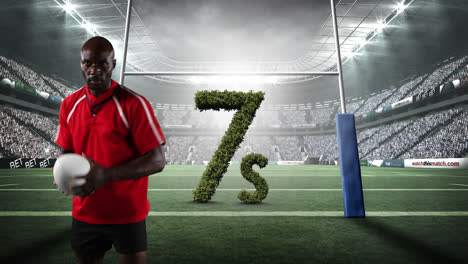 Animation-of-african-american-rugby-player-with-7s-text-in-rugby-field-sports-stadium
