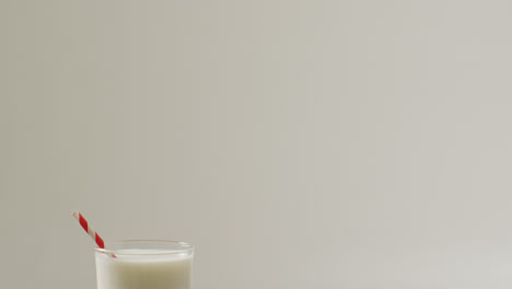 Video-of-glass-of-fresh-milk-on-white-background
