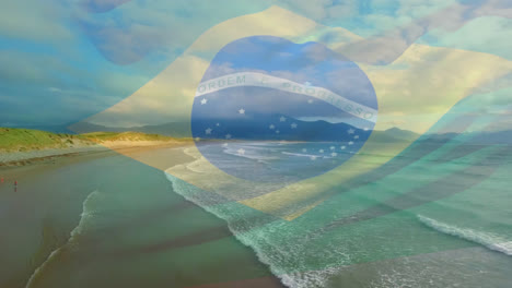 Composición-Digital-De-Ondear-La-Bandera-De-Brasil-Contra-La-Vista-Aérea-De-La-Playa-Y-Las-Olas-Del-Mar