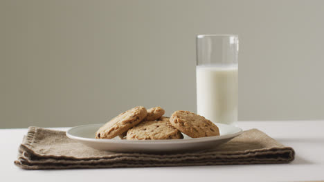 Video-of-biscuits-with-chocolate-and-milk-on-white-background