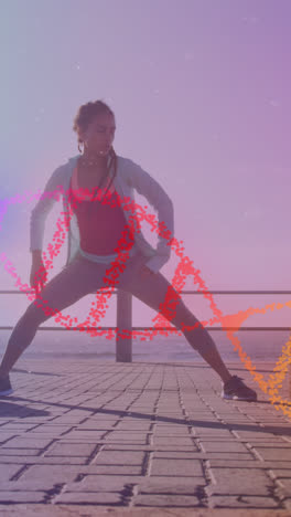 Animation-of-dna-strand-over-biracial-woman-stretching-on-promenade