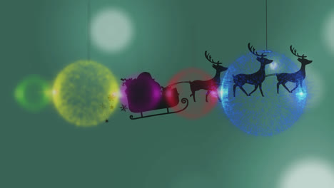 Animation-of-christmas-balls-over-santa-claus-in-sleigh-with-reindeer