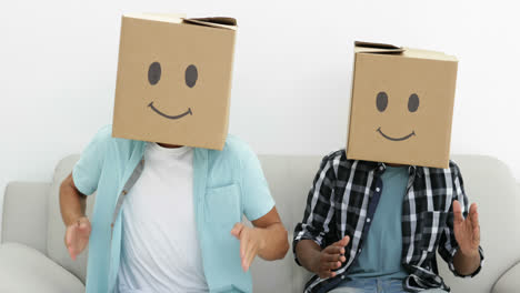 Silly-employees-with-boxes-on-their-heads-doing-the-robot