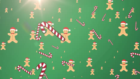 Animation-of-falling-christmas-canes-and-cookies-over-green-background