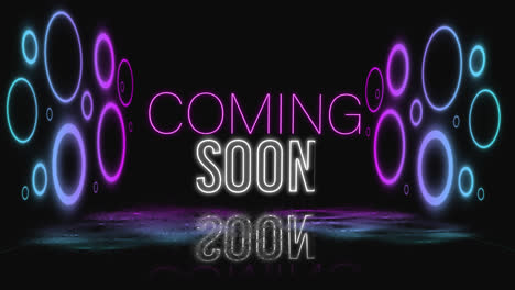 Animation-of-coming-soon-text-in-pink-and-white-with-colourful-neon-circles-on-black