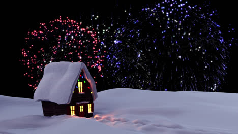 Fireworks-exploding-over-house-on-winter-landscape-against-black-background