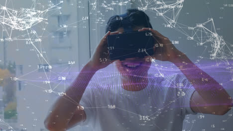 Animation-of-network-of-connections-over-biracial-man-using-vr-headset