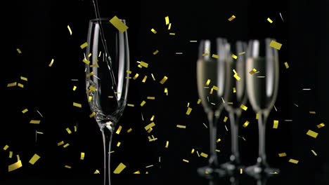 Animation-of-gold-confetti-falling-over-chmpagne-glasses-on-black-background