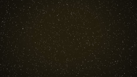 Animation-of-snow-falling-with-copy-space-over-black-background