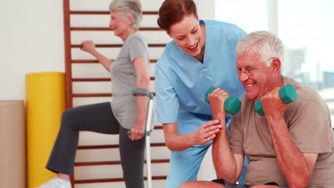 Senior-citizens-exercising-with-physiotherapist