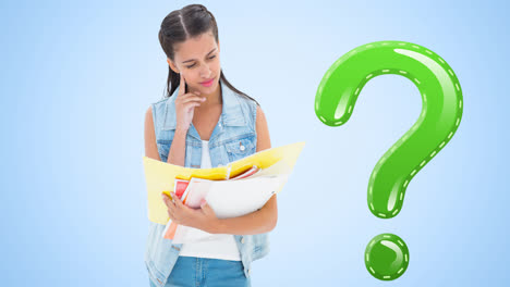 Animation-of-green-question-mark-over-biracial-teenage-girl-reading-and-holding-books,-on-blue