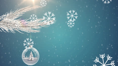 Snowflakes-falling-against-christmas-decorations-hanging-on-tree-branch-on-blue-background