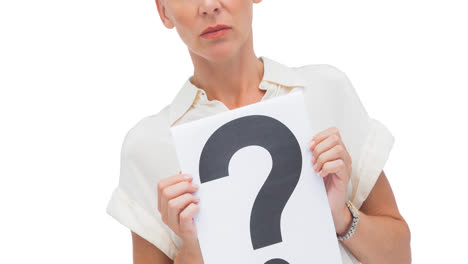 Confused-caucasian-businesswoman-holding-question-mark-sign