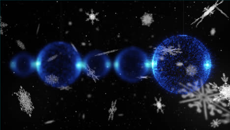 Animation-of-blue-christmas-balls-over-snow-falling-on-dark-background