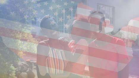 Animation-of-flag-of-usa-over-fappy-african-american-family-in-garden