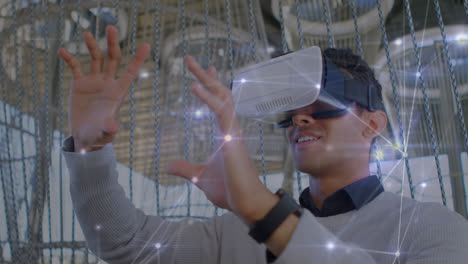 Animation-of-network-of-connections-over-biracial-man-using-vr-headset