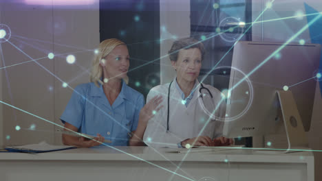 Animation-of-networks-of-connections-over-caucasian-female-doctors-using-computer