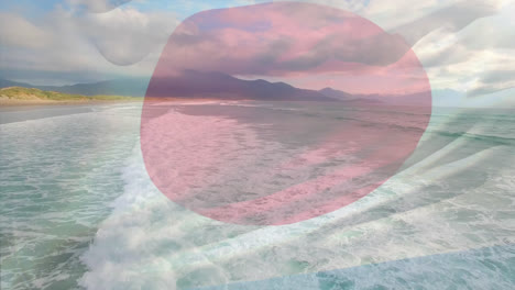 Digitale-Komposition-Aus-Wehender-Japanischer-Flagge-Vor-Der-Luftaufnahme-Des-Strandes