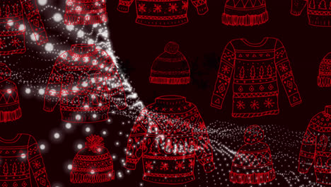 Animation-of-glowing-light-and-christmas-sweatshirts-and-hats-over-dark-background