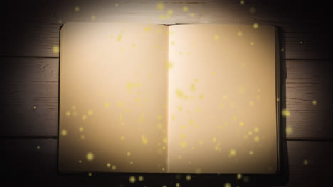 Animation-of-yellow-glowing-spots-over-open-book-with-copy-space