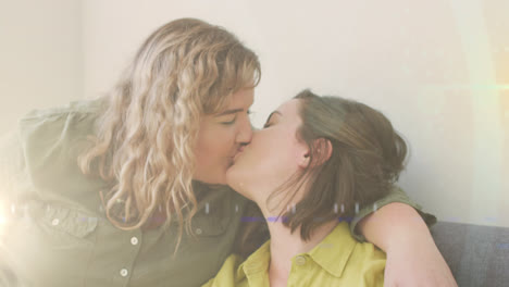 Animation-of-light-over-happy-caucasian-female-gay-couple