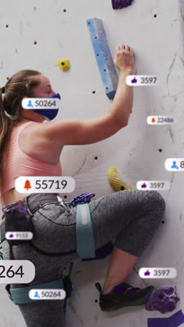 Multiple-speech-bubbles-with-digital-icons-against-caucasian-fit-woman-wall-climbing-at-the-gym