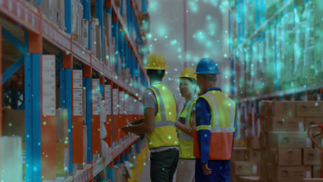 Animation-of-glowing-spots-over-diverse-people-working-in-warehouse