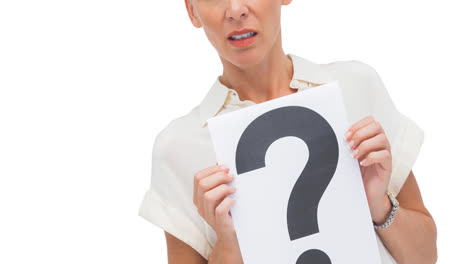 Confused-caucasian-businesswoman-holding-question-mark-sign