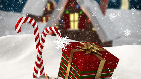 Animation-of-falling-snowflakes-over-christmas-gift-and-candy-canes