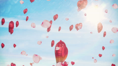 Animation-of-heart-balloons-over-clouds