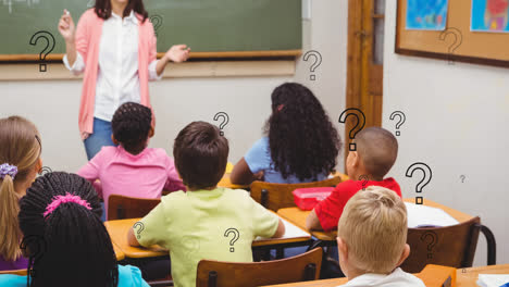 Animation-of-question-marks-over-female-elementary-school-teacher-and-diverse-pupils-in-class