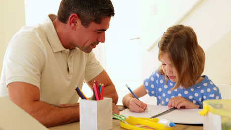 Father-and-daughter-drawing-together