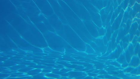 Underwater-shot-of-blue-swimming-pool