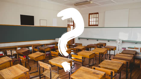 Animation-of-white-question-mark-over-chairs-and-desks-in-empty-school-classroom