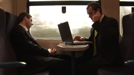 Businessman-Working-on-a-Train