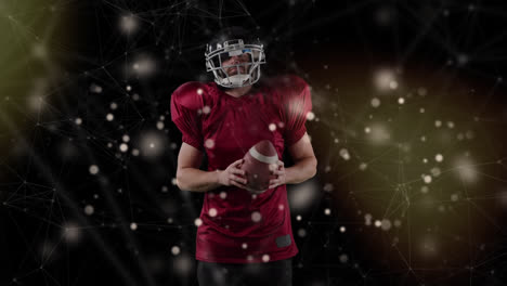 Animation-of-lights-and-constellations-over-american-football-player-on-black-background