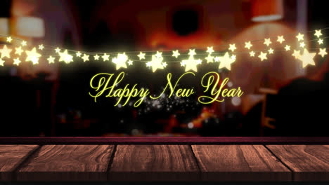 Animation-of-fairy-lights-and-happy-new-year-text-over-wooden-boards