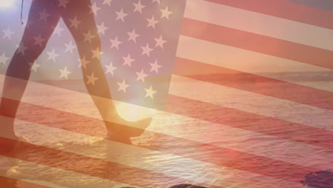 Animation-Der-Flagge-Der-Vereinigten-Staaten-Von-Amerika-über-Einer-Frau,-Die-Am-Strand-Spazieren-Geht