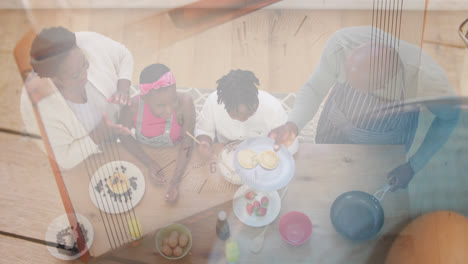 Komposit-Aus-Afroamerikanischen-Großeltern-Und-Enkelkindern,-Die-Essen-Zubereiten,-Und-Zutaten-In-Einer-Schüssel