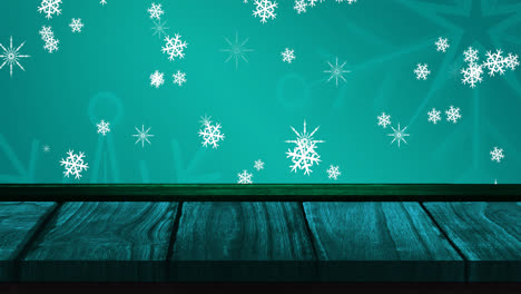 Animation-of-falling-snowflakes-on-blue-background-and-wooden-floor